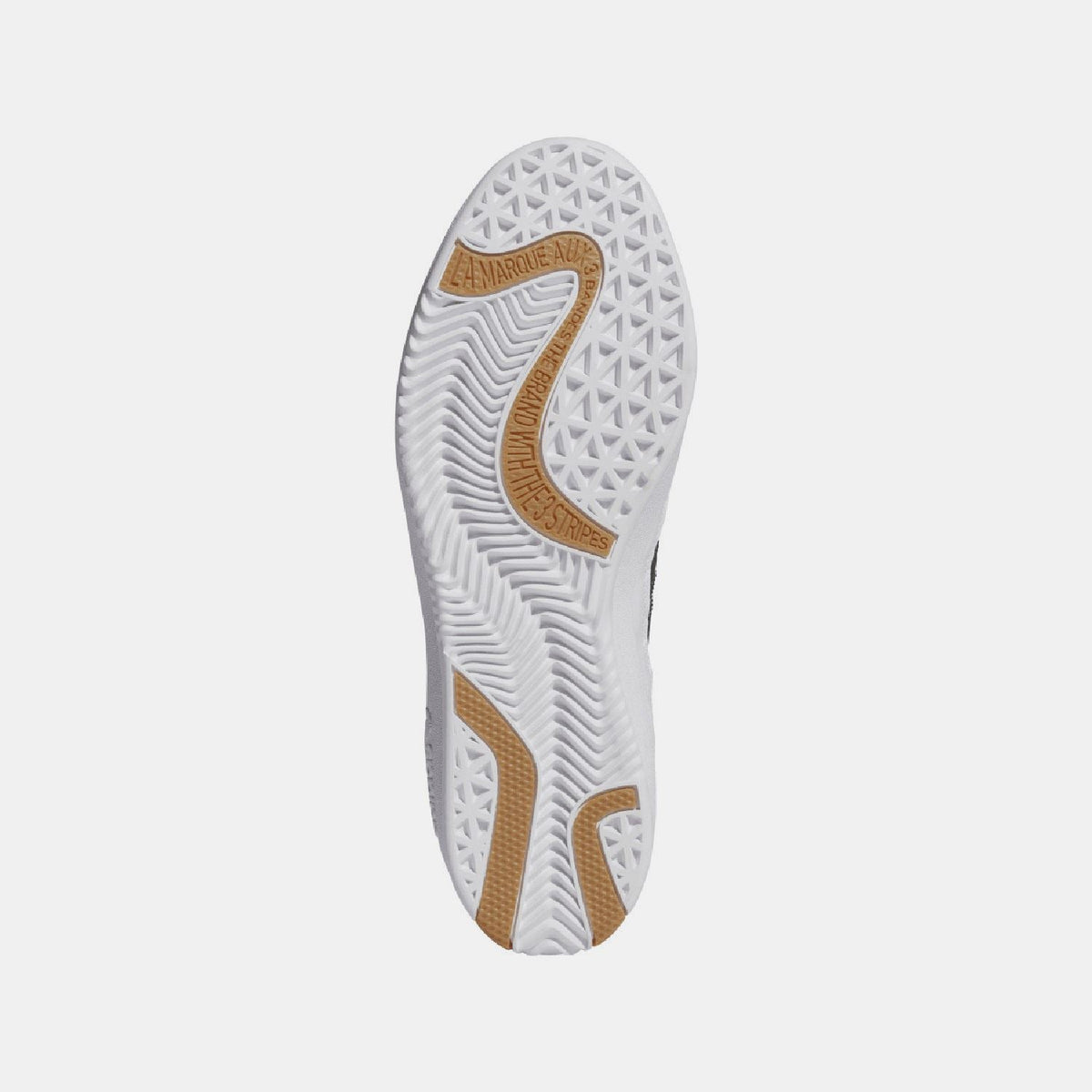 White trainers outsole view with textured tread and brown accent inserts