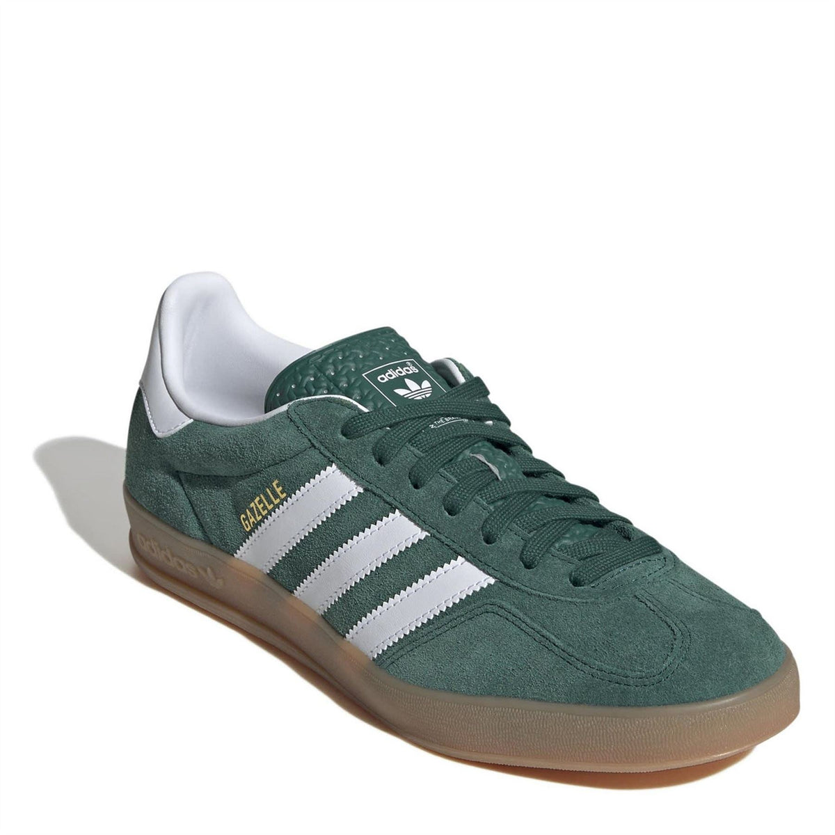 Green adidas Gazelle low-top sneakers with white stripes and lace-up front