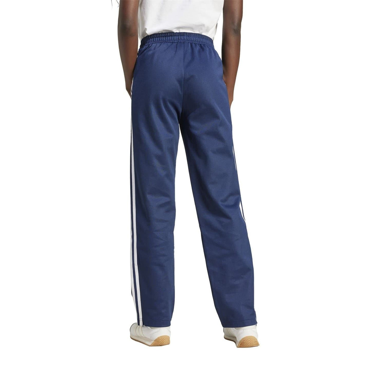 adidas Originals track pants in navy blue with vertical three white side stripes, open hem
