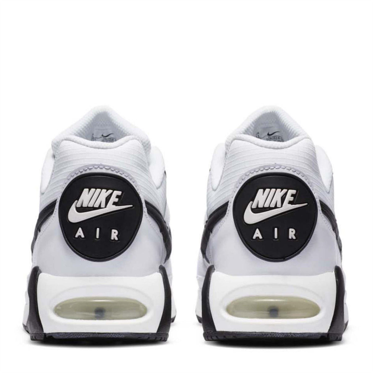 White Nike Air Max Ivo trainers showing heel with Nike Air badge and translucent sole air window