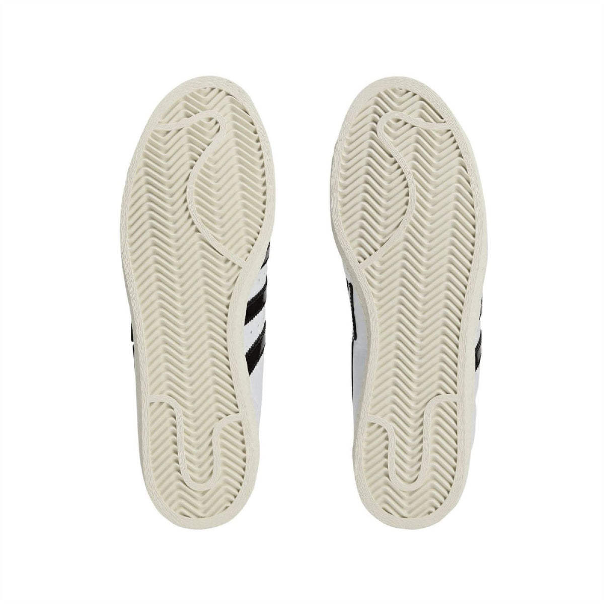 White Adidas Originals SSTR sneaker outsoles with textured herringbone tread
