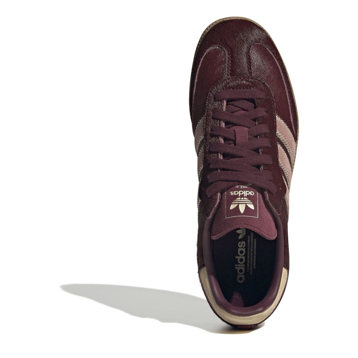 Burgundy adidas Samba OG lace-up sneakers with tongue label and lace detail, gum sole