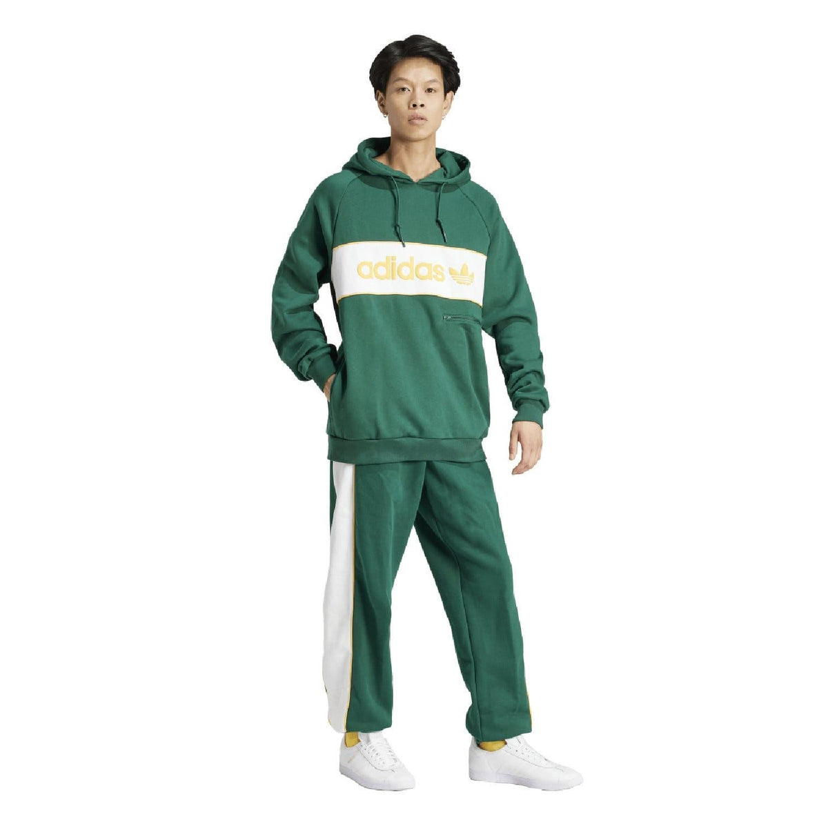 Green adidas Originals hoodie with hood, drawstrings, and white logo band