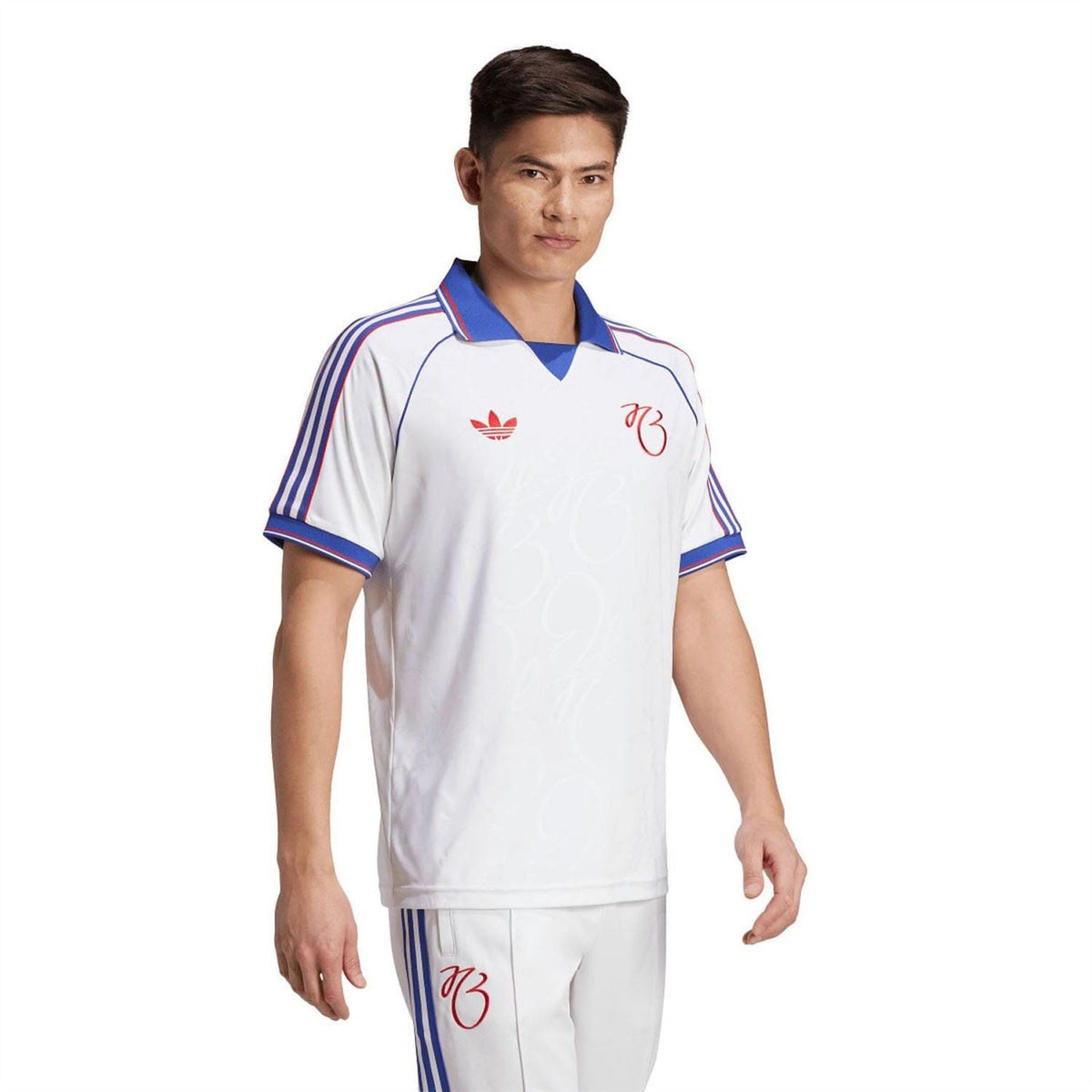 adidas Originals Bellingham Polo Shirt featuring a classic design, cotton fabric, and the iconic adidas logo on the chest.