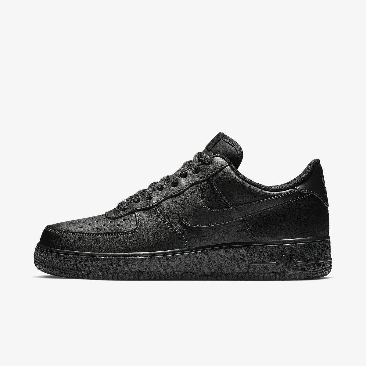 Black leather low-top sneakers with lace-up front and swoosh detail