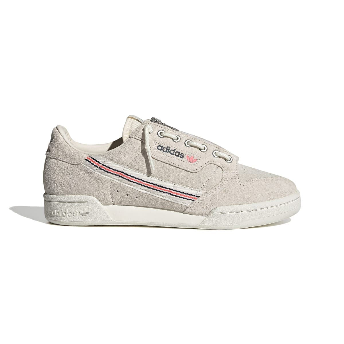 Light beige suede low-top trainers with lace-up closure, adidas logo, side stripe detail