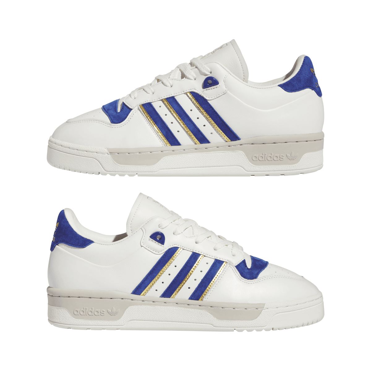 adidas Rivalry 86 low-top trainers set, white uppers with blue heel and gold-striped details