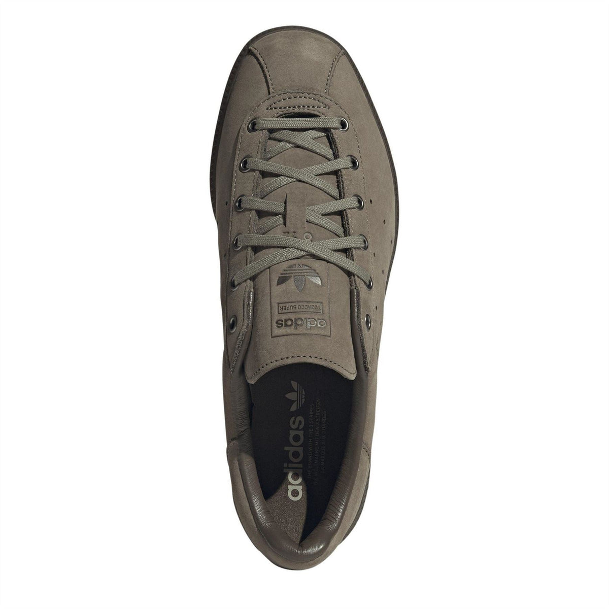Sneaker showing inner sole with adidas branding and lace-up opening in dark brown