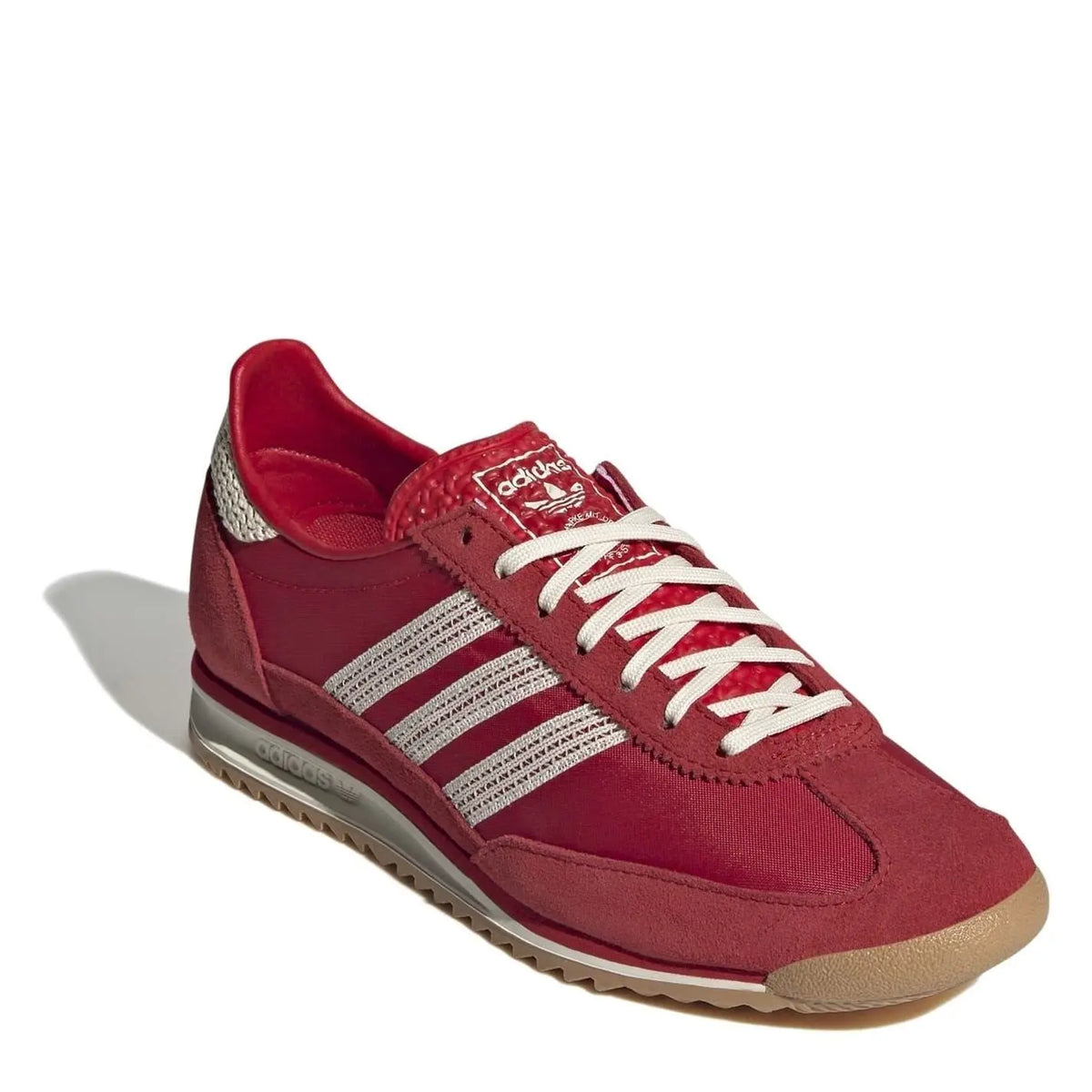 adidas Originals Sl72 shoes in classic white with retro design, featuring canvas uppers and rubber soles for casual footwear style