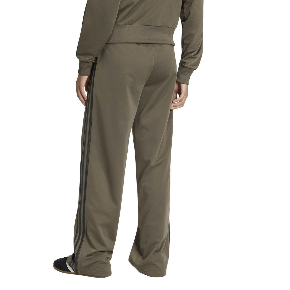 Olive green womens woven jogger pants with side stripes and elastic cuffs
