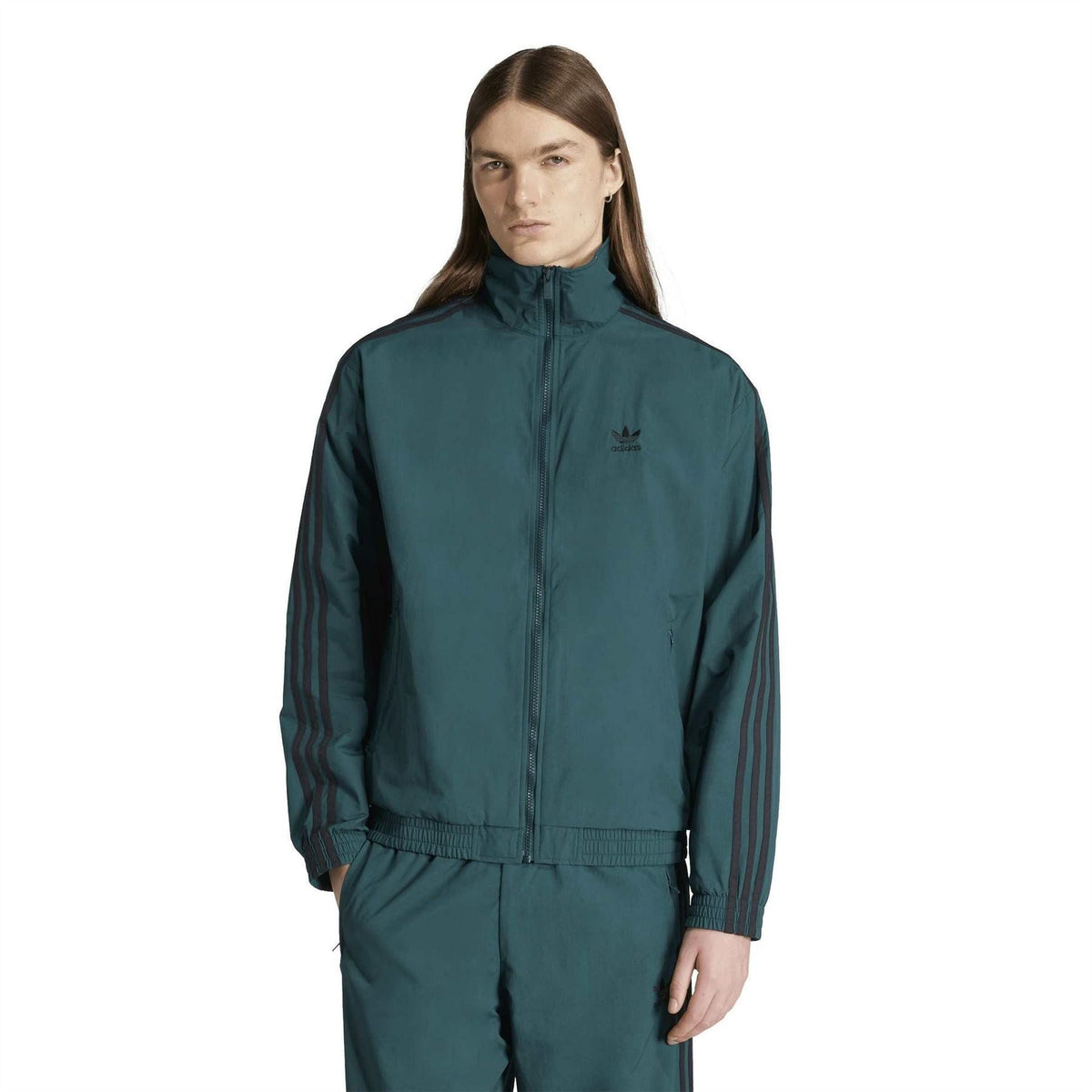 Women’s adidas teal zip-up track jacket with stand collar and three-stripe sleeves