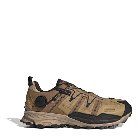 Beige low-top lace-up hiking sneaker with black accents and rugged rubber sole