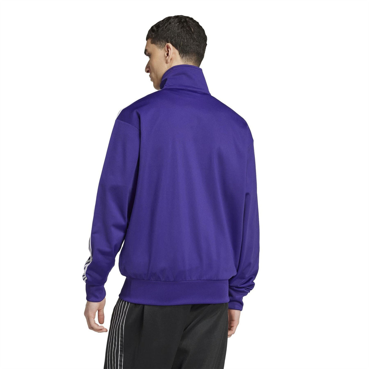 adidas Originals Firebird zip neck long sleeve athletic top, black tracksuit shirt with ribbed cuffs and zip collar, front view