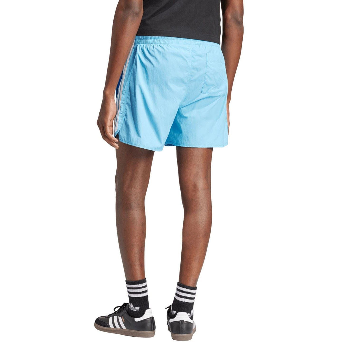 adidas Originals sprinter shorts, light blue with elastic waistband and white side stripes