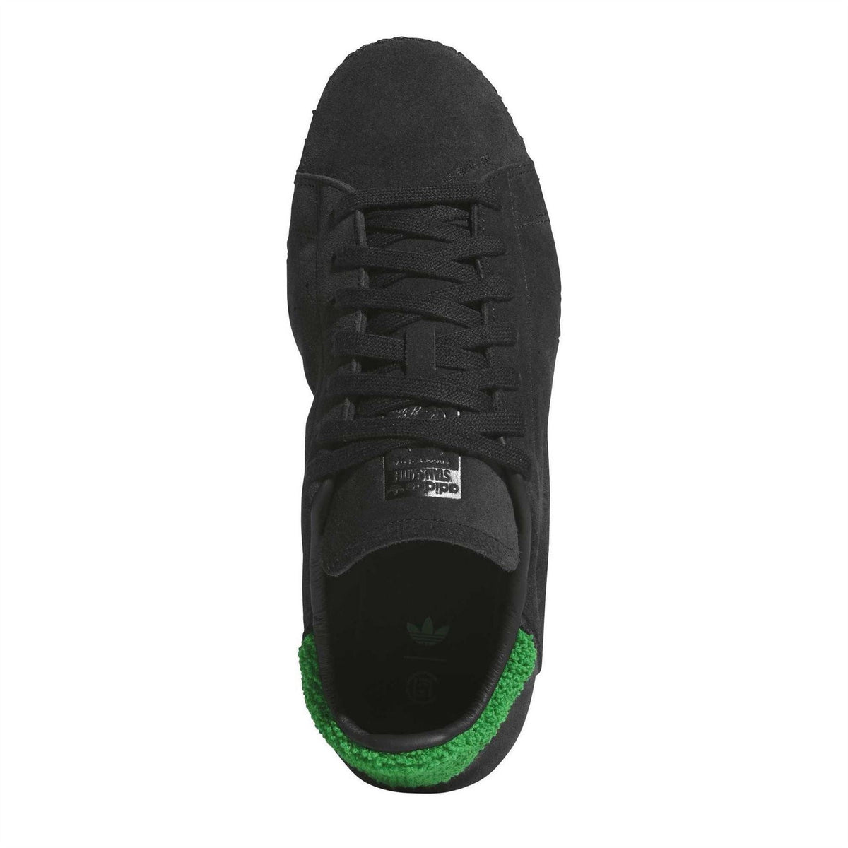 adidas Stan Smith sneaker in core black with green trim and black laces