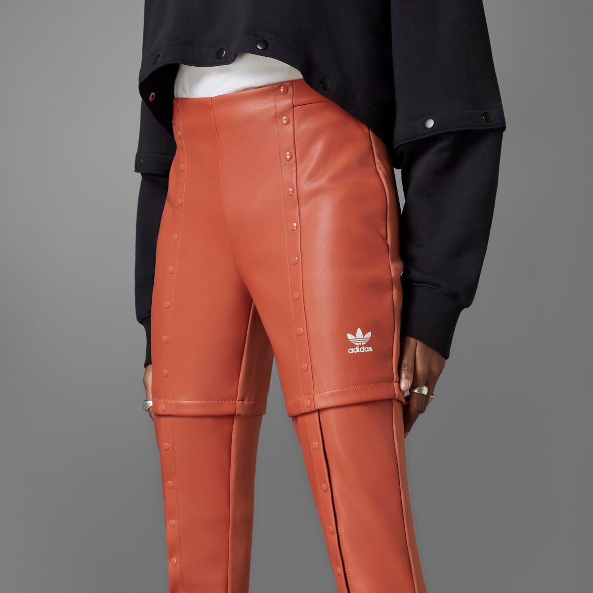 adidas Originals Slim Pant showing tapered fit, black fabric, and athletic style trousers designed for comfort and casual wear