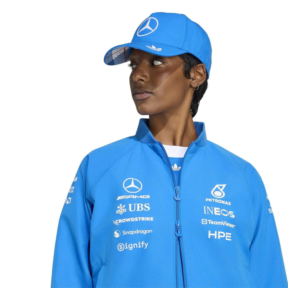 adidas Originals Mercedes blue track jacket close-up, stand collar, front logo print
