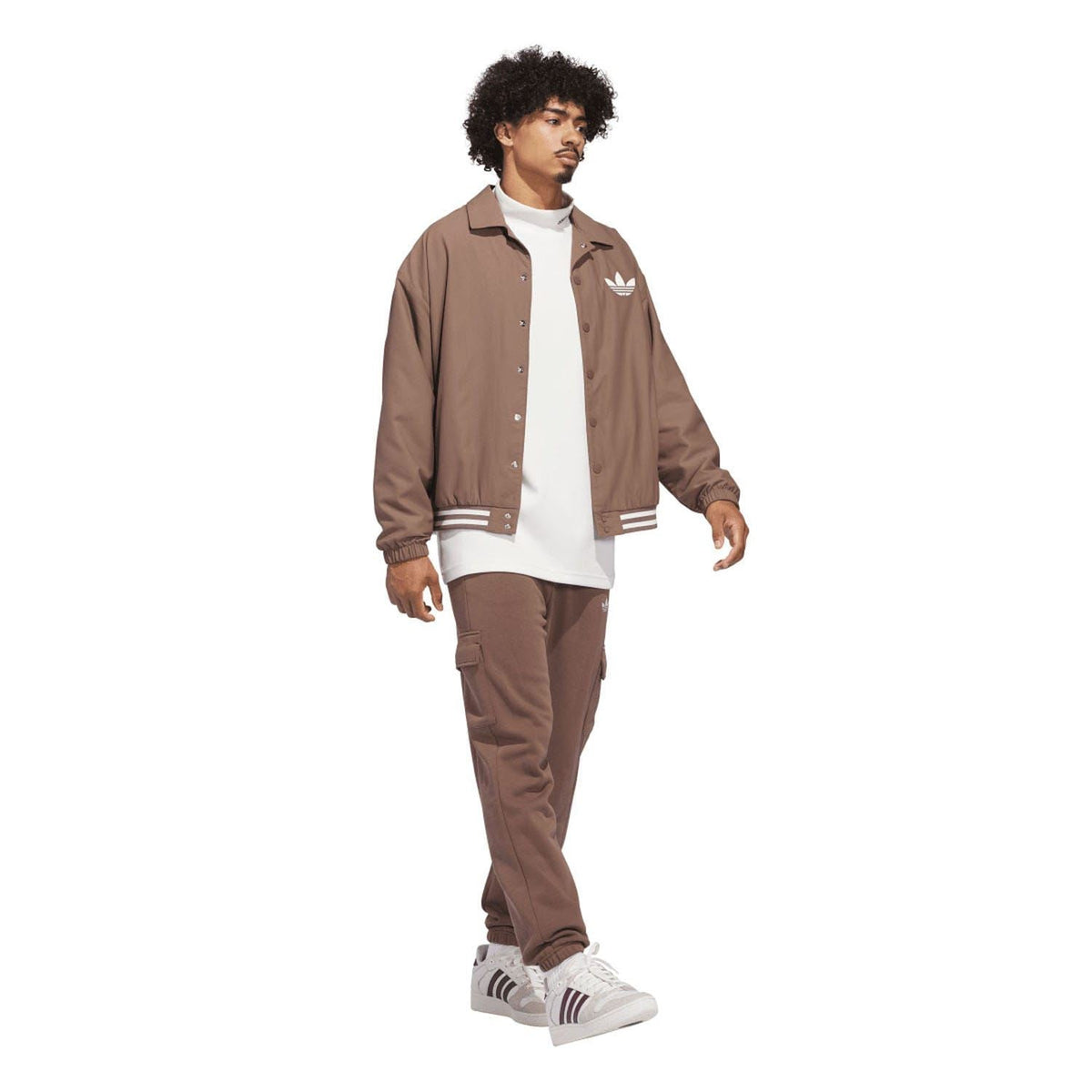 Brown coach overshirt worn with matching pants; trefoil logo and ribbed trim