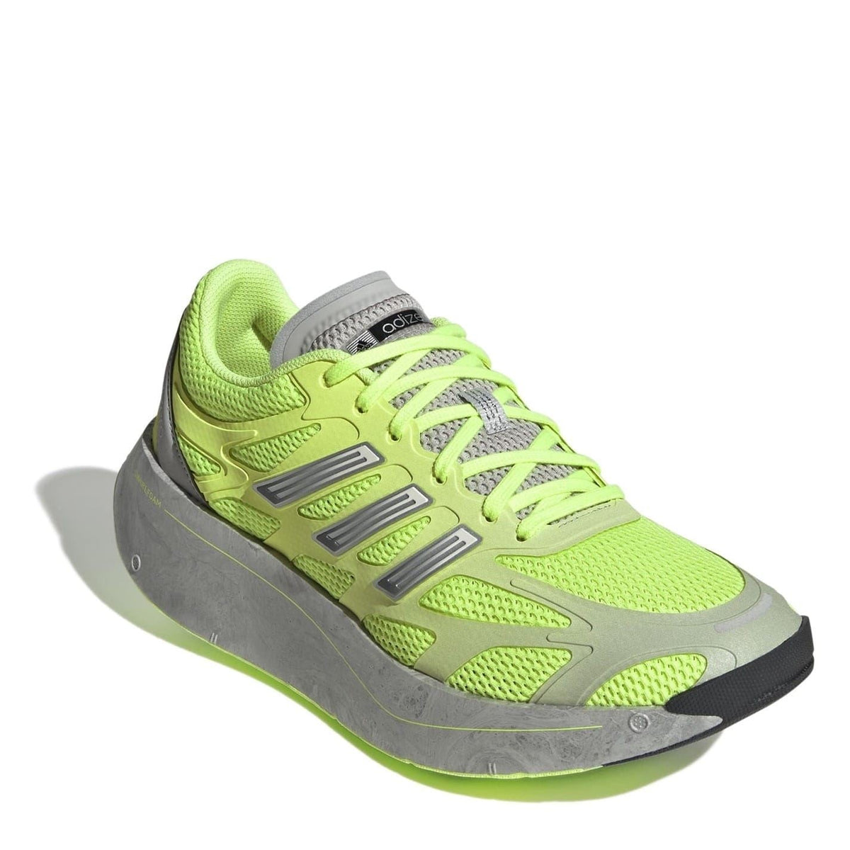 Front angled lace-up low top sneakers in neon green with grey overlay and tread sole