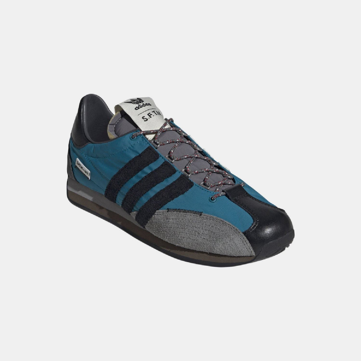 Teal, black, and gray adidas Country OG lace-up trainers with suede toe and stripes
