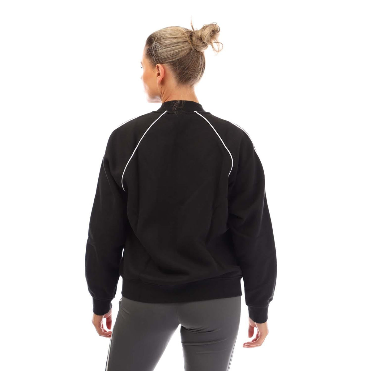 Black fleece bomber jacket, back view with white 3-Stripes on sleeves and zip neck
