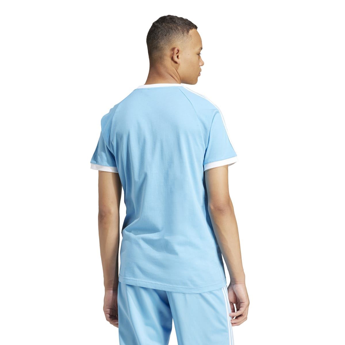 Light blue crew-neck T-shirt back view with white three-stripe sleeve details