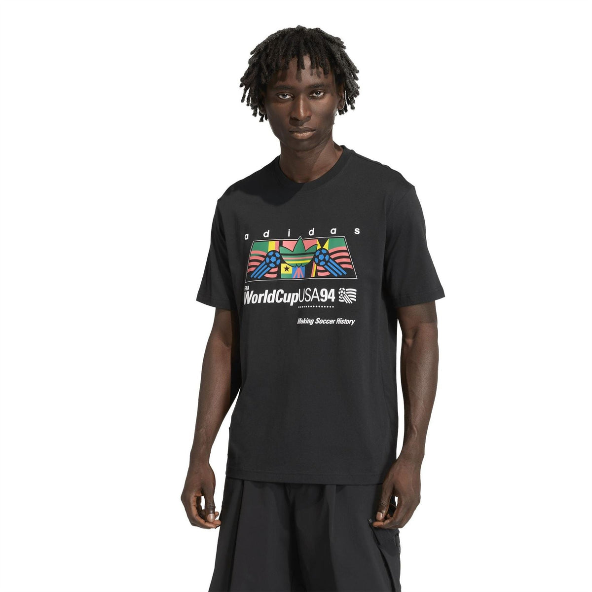 Black crew-neck T-shirt with colorful WorldCupUSA94 and adidas logo graphic on chest