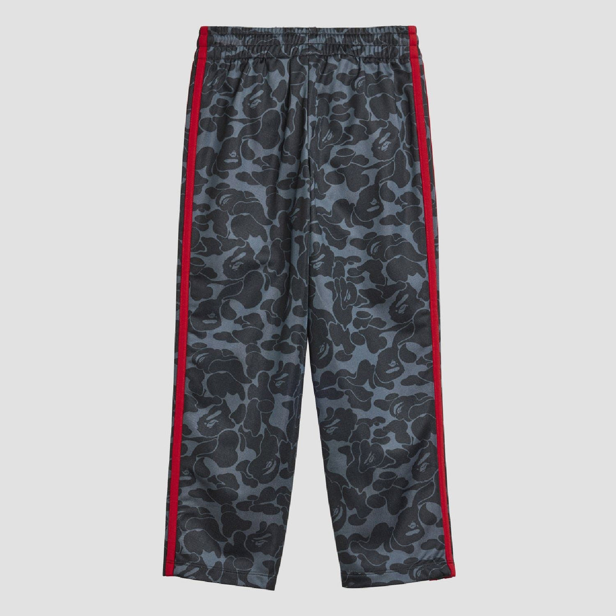 Kids camo track pants with red side stripes and elastic waistband