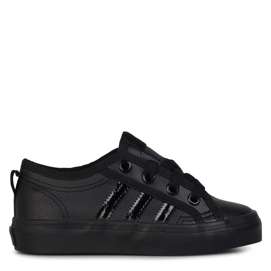 Adidas Originals juniors Nizza low top sneakers for children, size 10-2, featuring white canvas and rubber soles.