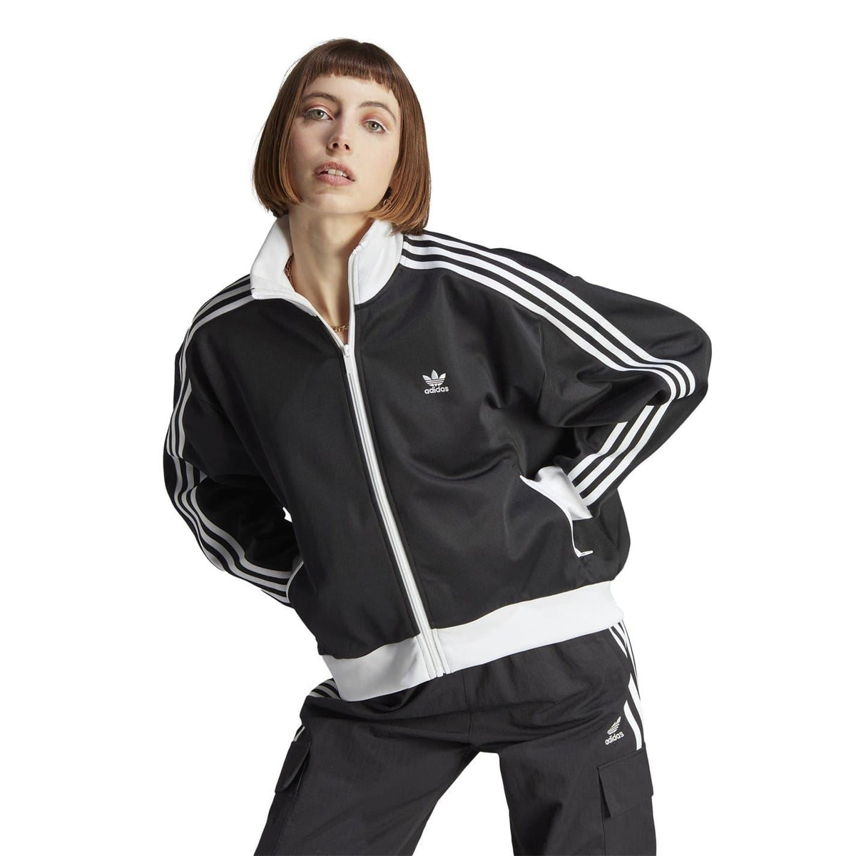 adidas Originals high neck ribbed cuff sweatshirt jacket in black with a sporty design and visible logo on the chest