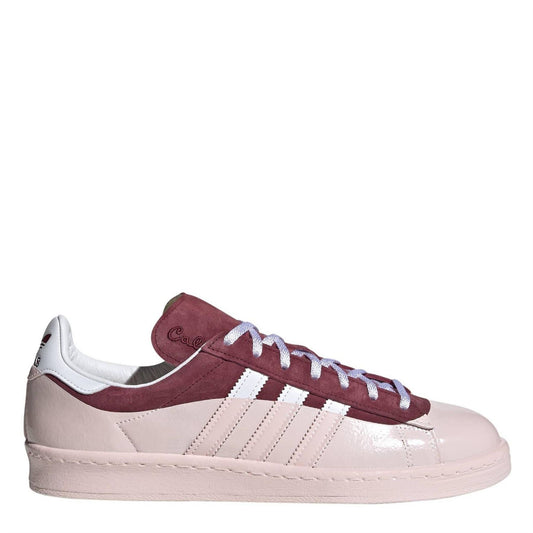 Colorblock low-top trainers with burgundy suede panels, white stripes, and lace-up front