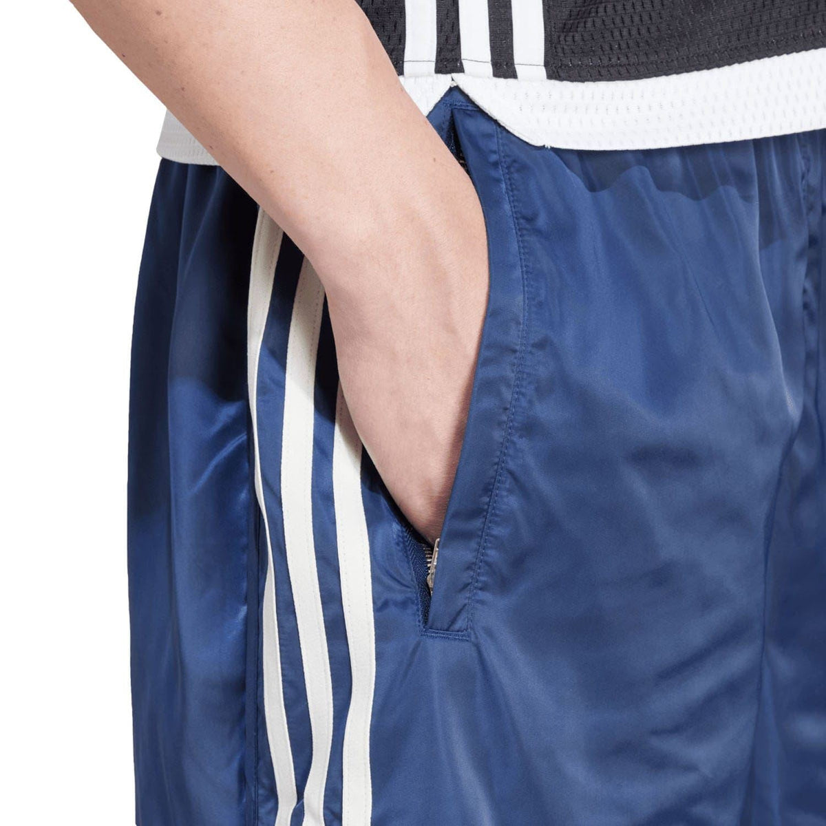 Indigo blue adidas Originals sprinter shorts with front pocket and white side stripe trim