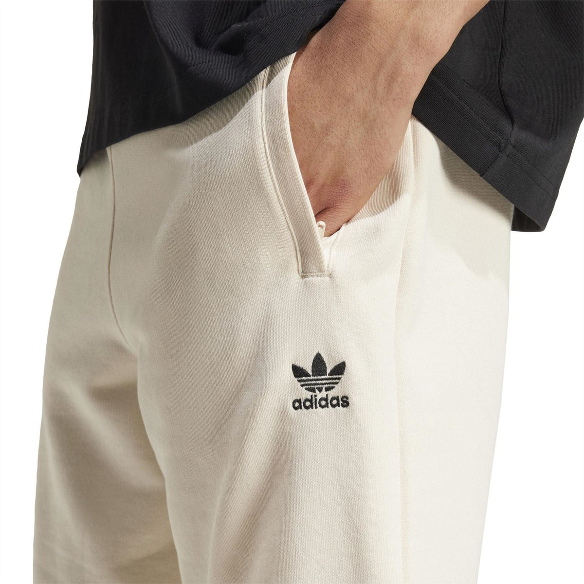 Wonder White adidas Originals shorts with front logo and angled side seam details