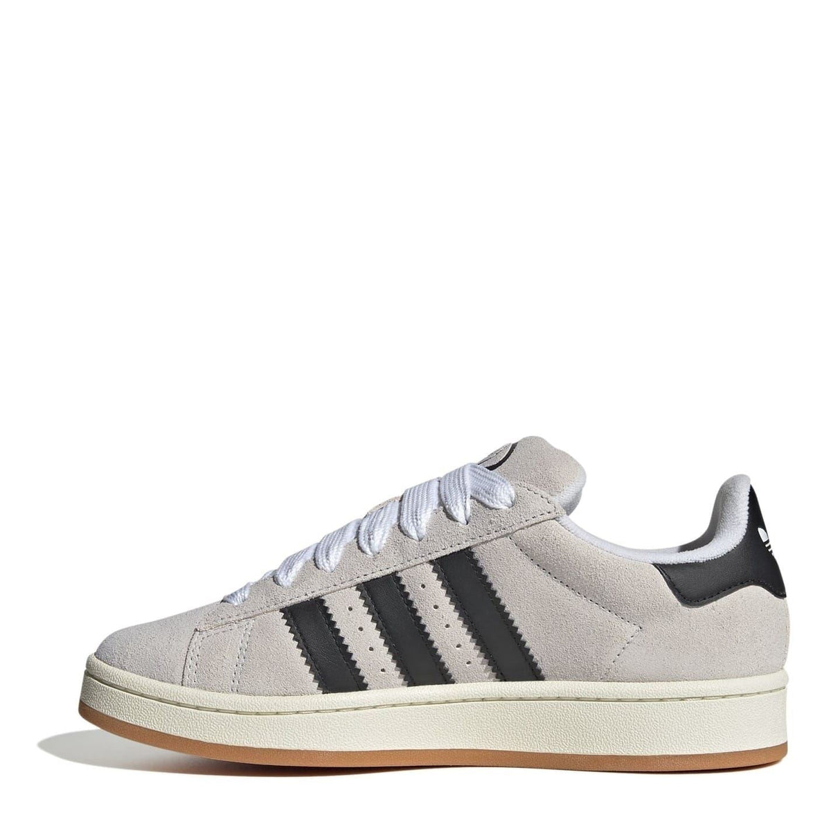 Light gray low top sneakers with black adidas stripes, white laces, and gum-toned sole