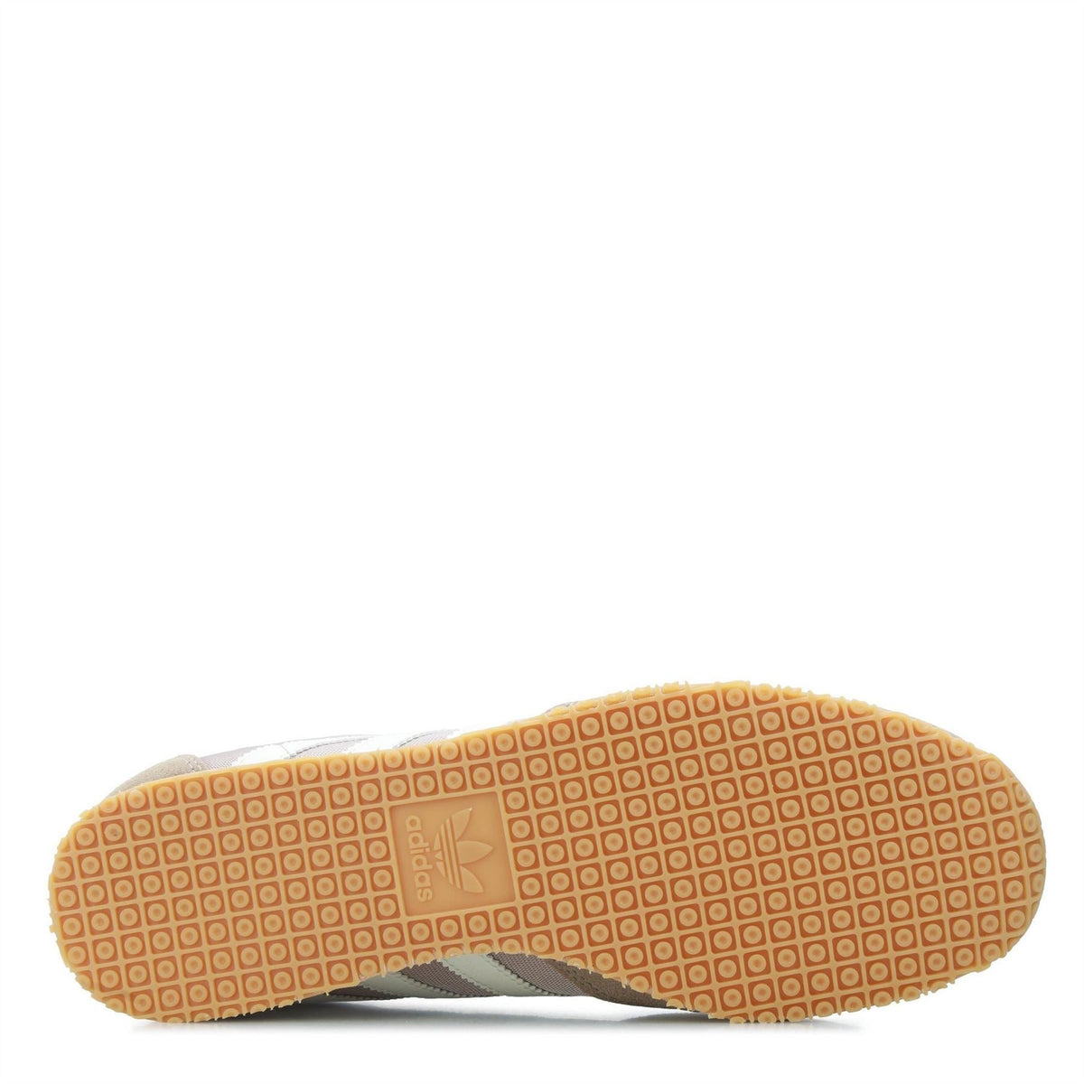 Beige adidas Galaxy OG trainers with orange-brown outsole and patterned traction tread