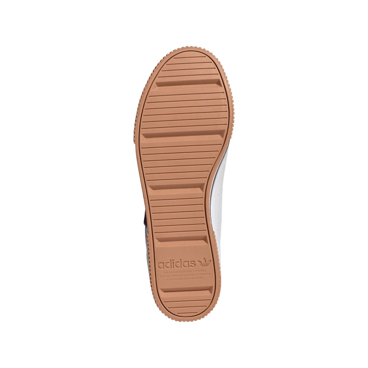 Brown gum outsole with adidas logo and tread pattern on white trainer base