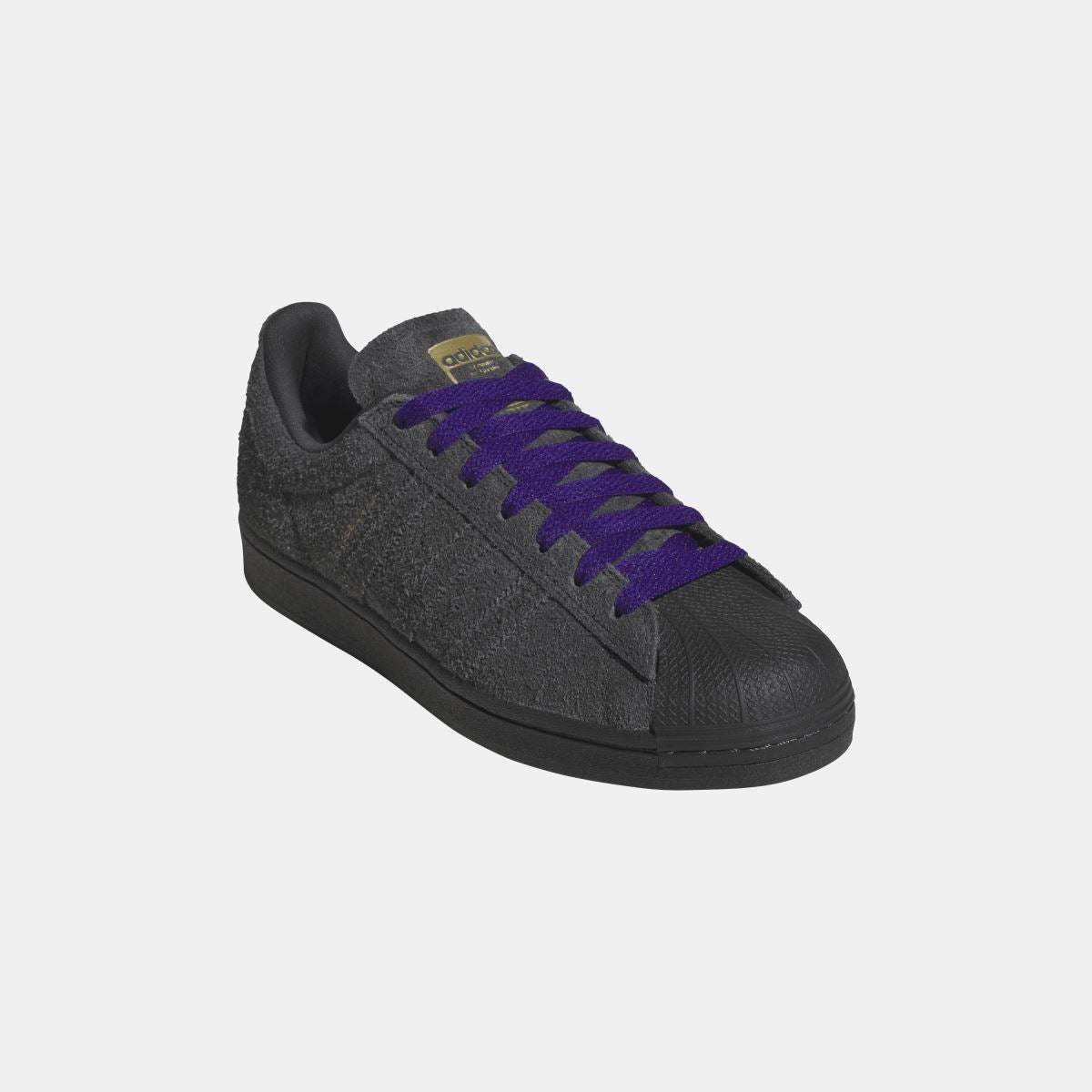 Adidas Originals Superstar ADV shoes featuring classic white leather uppers, rubber sole, and iconic three-stripe design.