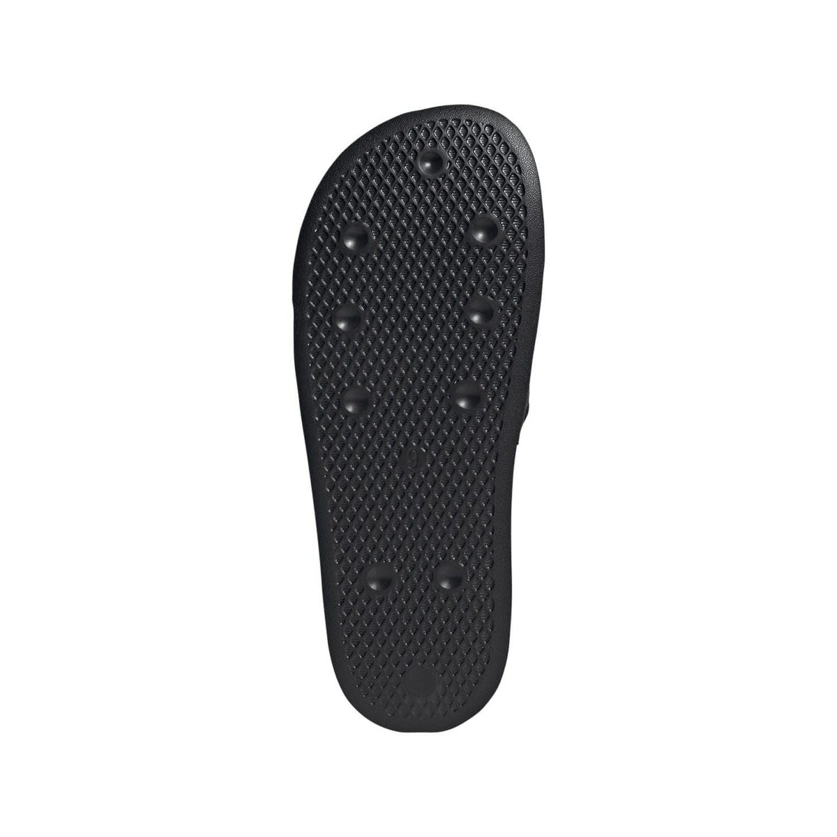 Black slide sandal outsole with textured traction studs