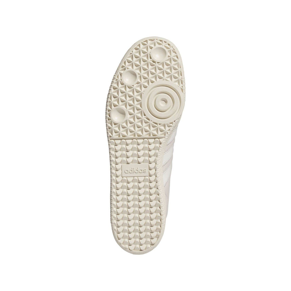 White rubber outsole for trainers with geometric tread and circular logo detail