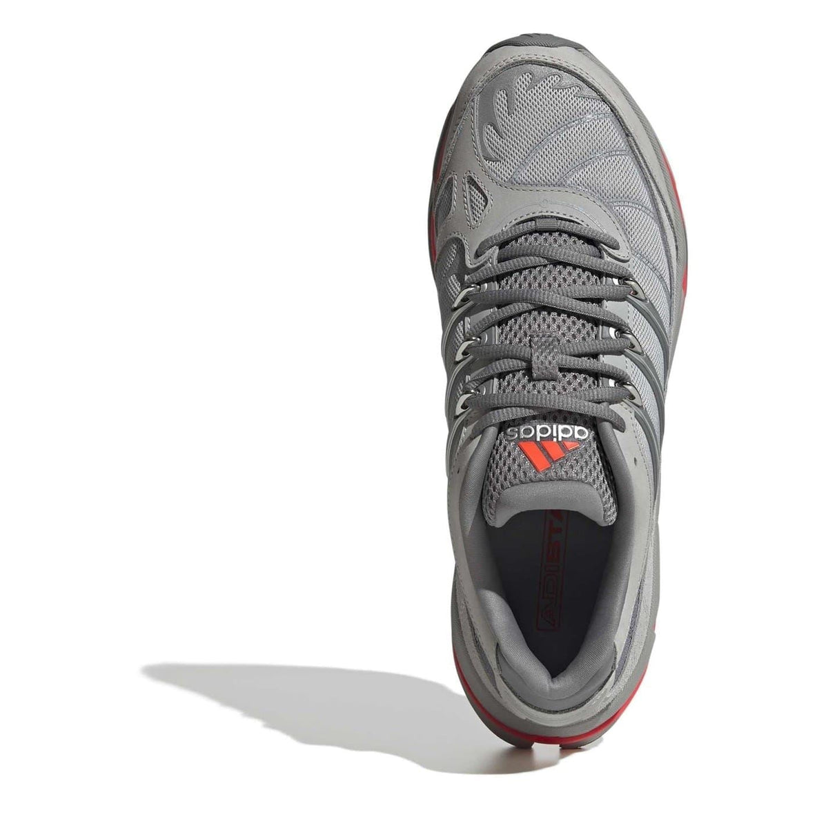 Dark grey lace-up sneaker with adidas tongue logo and red heel accent