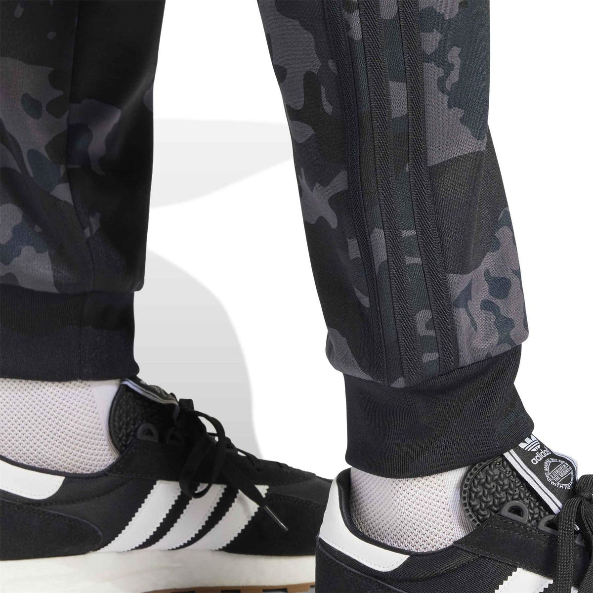 adidas Originals camo track pants detail, side panel seam and elastic ribbed cuff