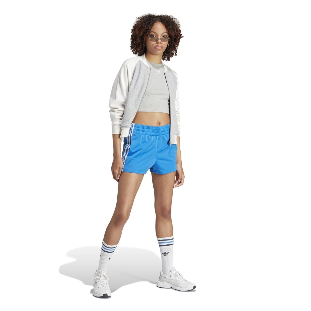 Blue Adidas Originals shorts with elastic waistband and three white side stripes