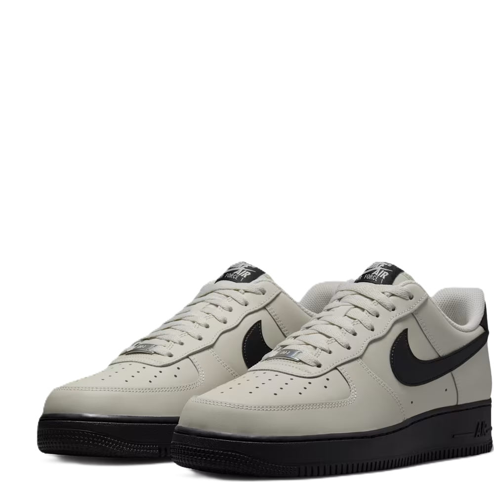 Nike Air Force 1 '07 low-top sneakers pair, light bone with black Swoosh and black rubber sole
