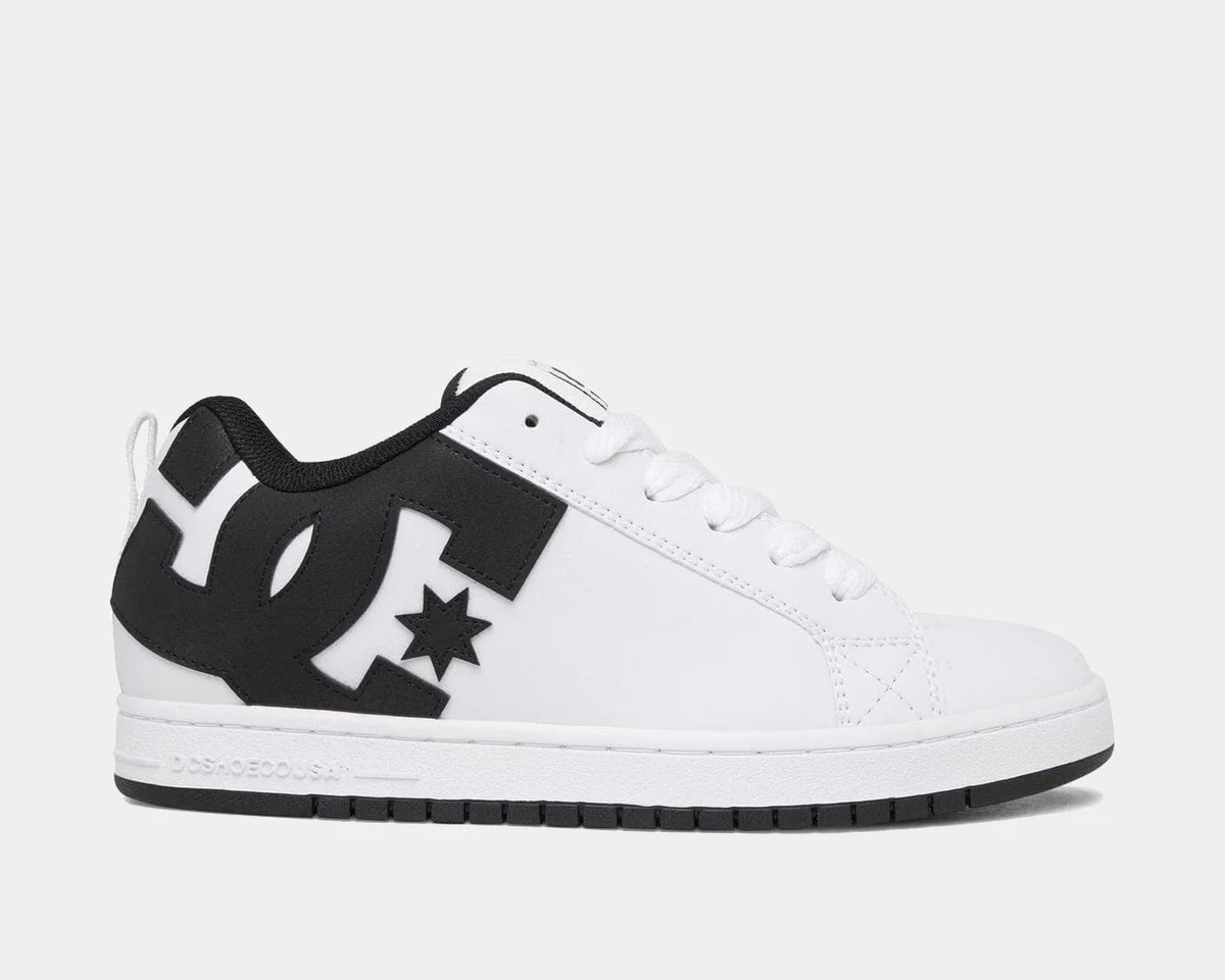White skate sneaker with black overlays, star logo, and lace-up design
