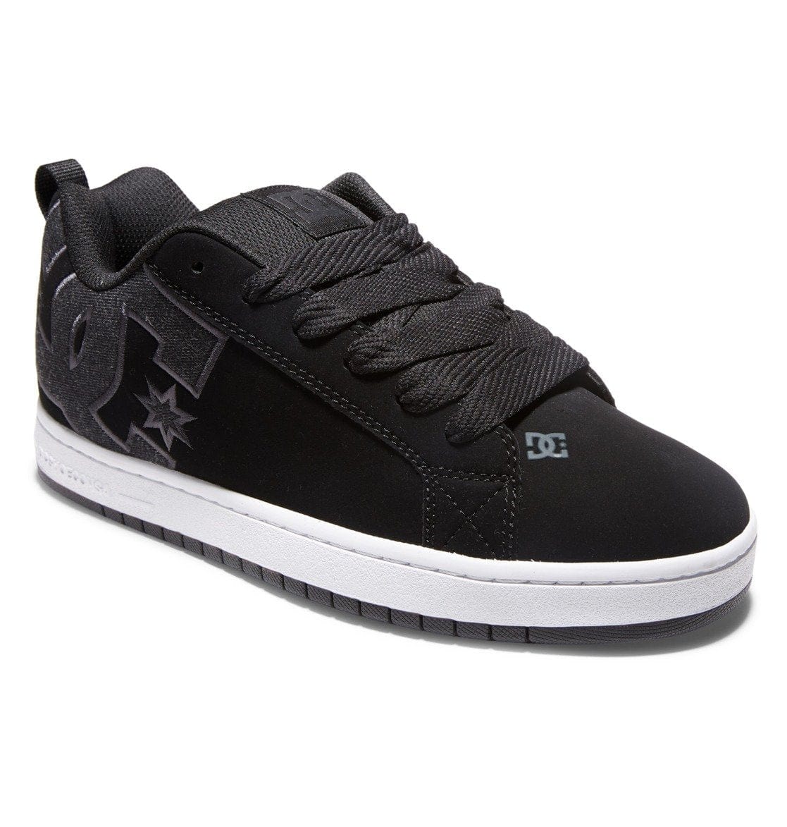 Black low-top sneaker with star logo, DC logo, and white midsole
