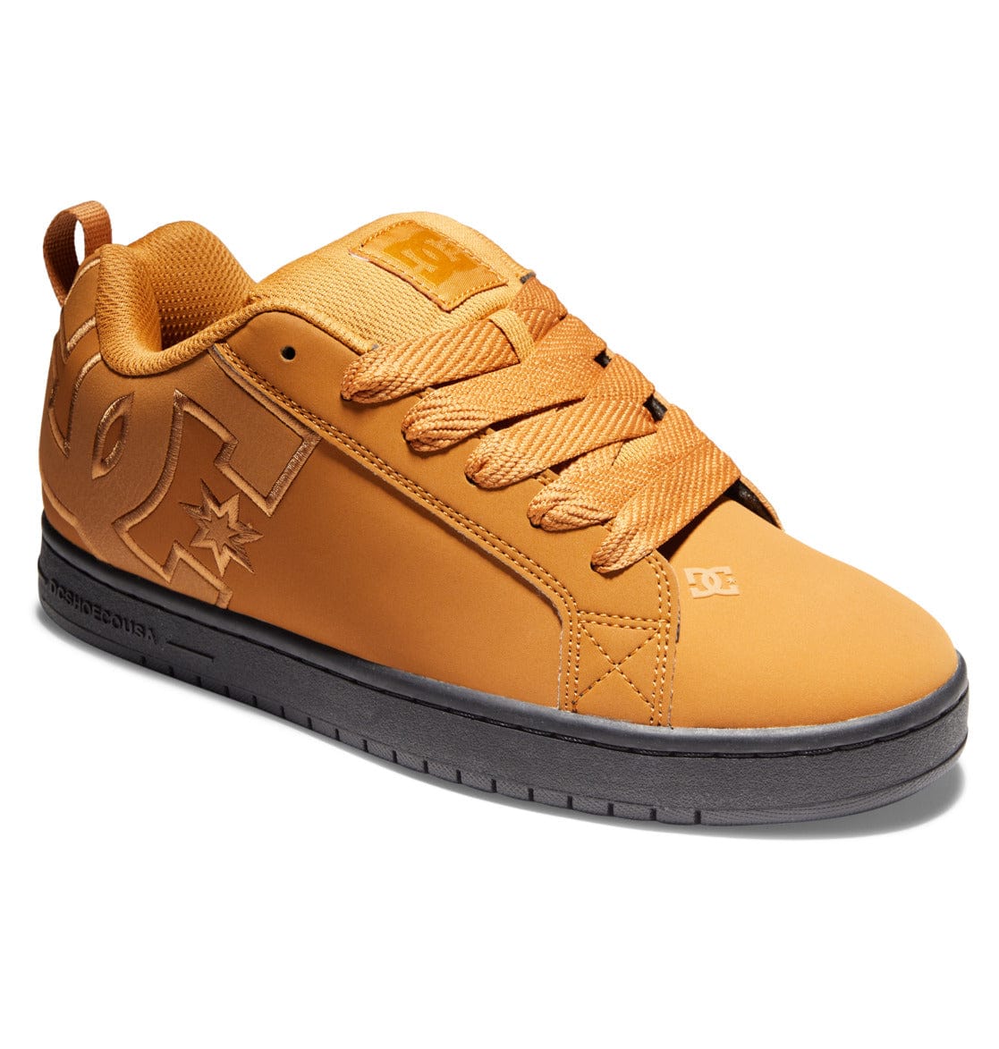 Tan/orange lace-up sneakers with embossed star and DC emblem on side