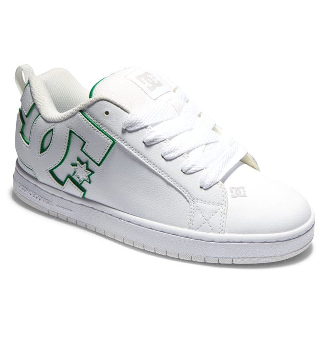 White low-top sneakers with green logo artwork and white lace-up design