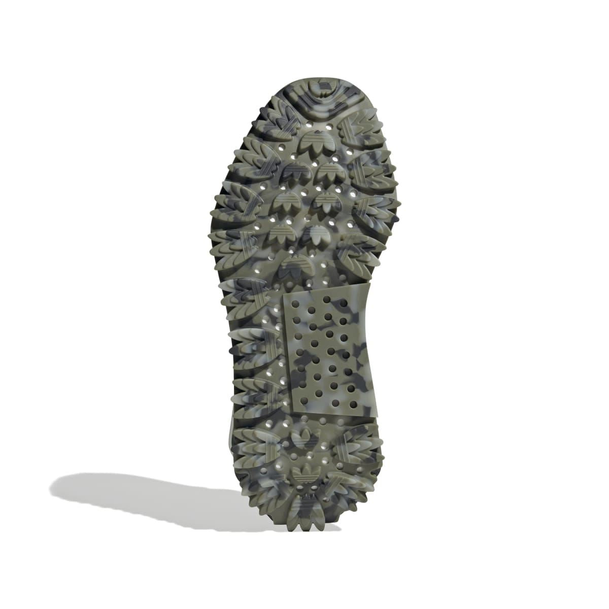 adidas NMD_S1 outsole with dense rubber studs and traction pattern in dark olive