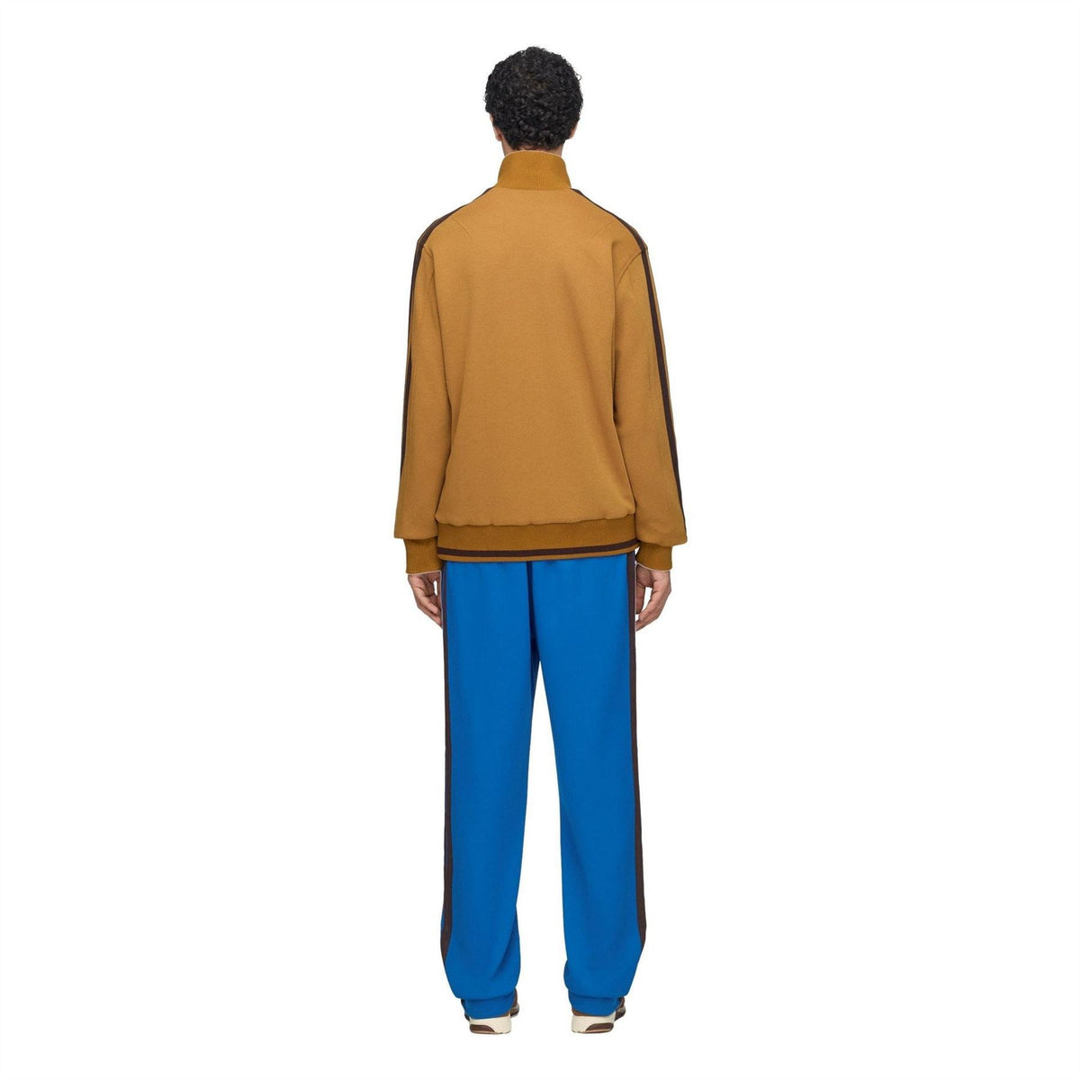 Men's tan track top with ribbed stand collar; back view with dark stripe detail on sleeves.