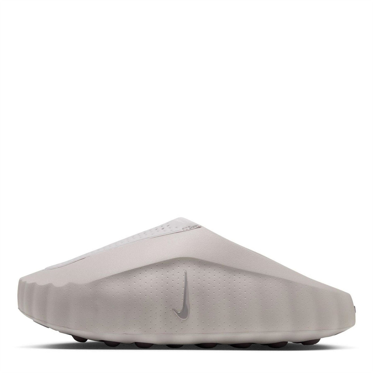 Light gray Nike slide sandals with perforations and cushioned footbed